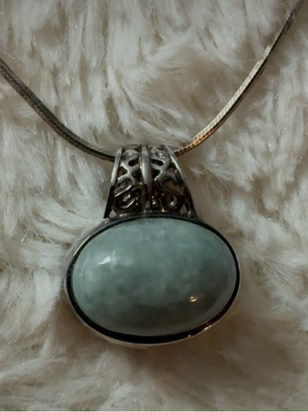 Silver/Jade pendant on a 20 inch chain